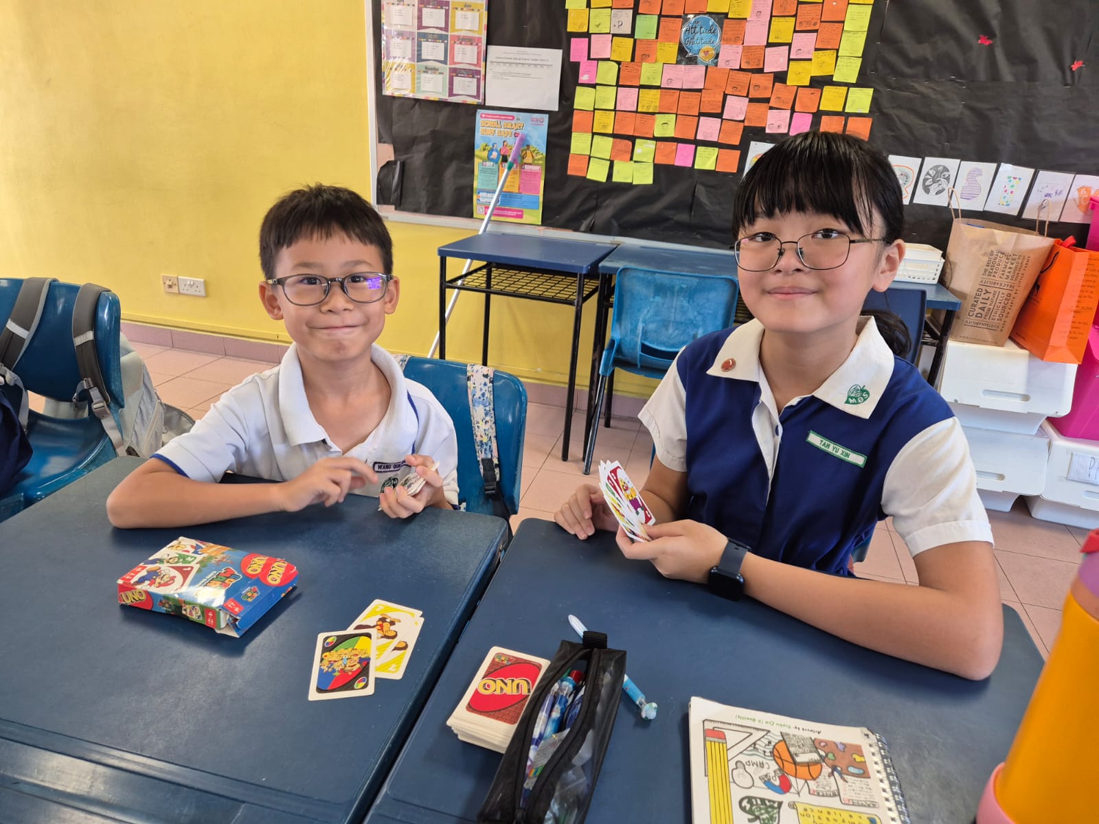 Pupils in school attire bonding through games during Back to School Programme