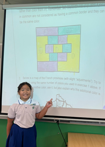 Pupils presenting their solution after group work.