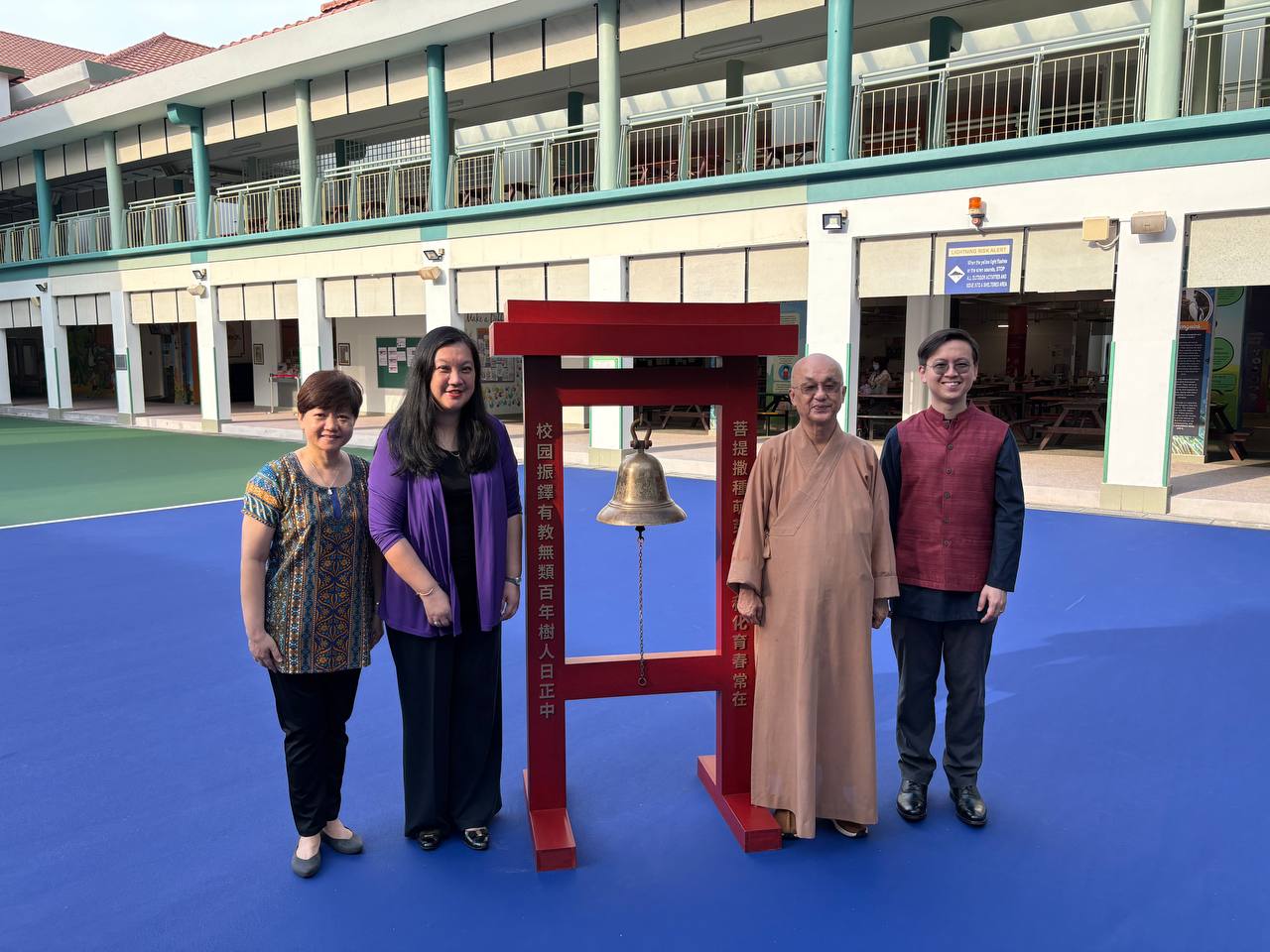 Venerable Seck Kwang Phing and School Leaders commemorating the opening of the Parade Square.