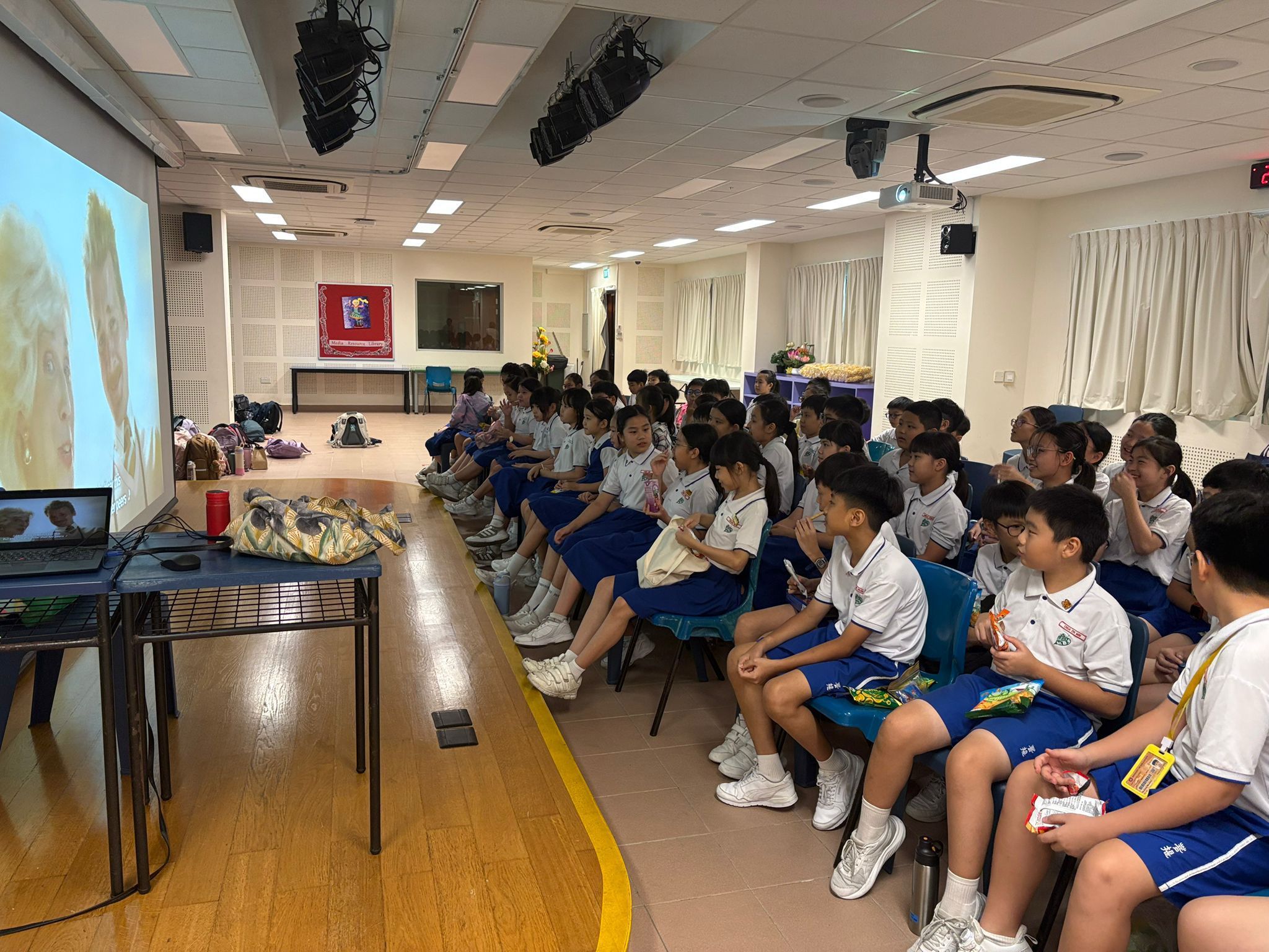 Top-reading P4 and P5 class were rewarded with Movie with Popcorn session.