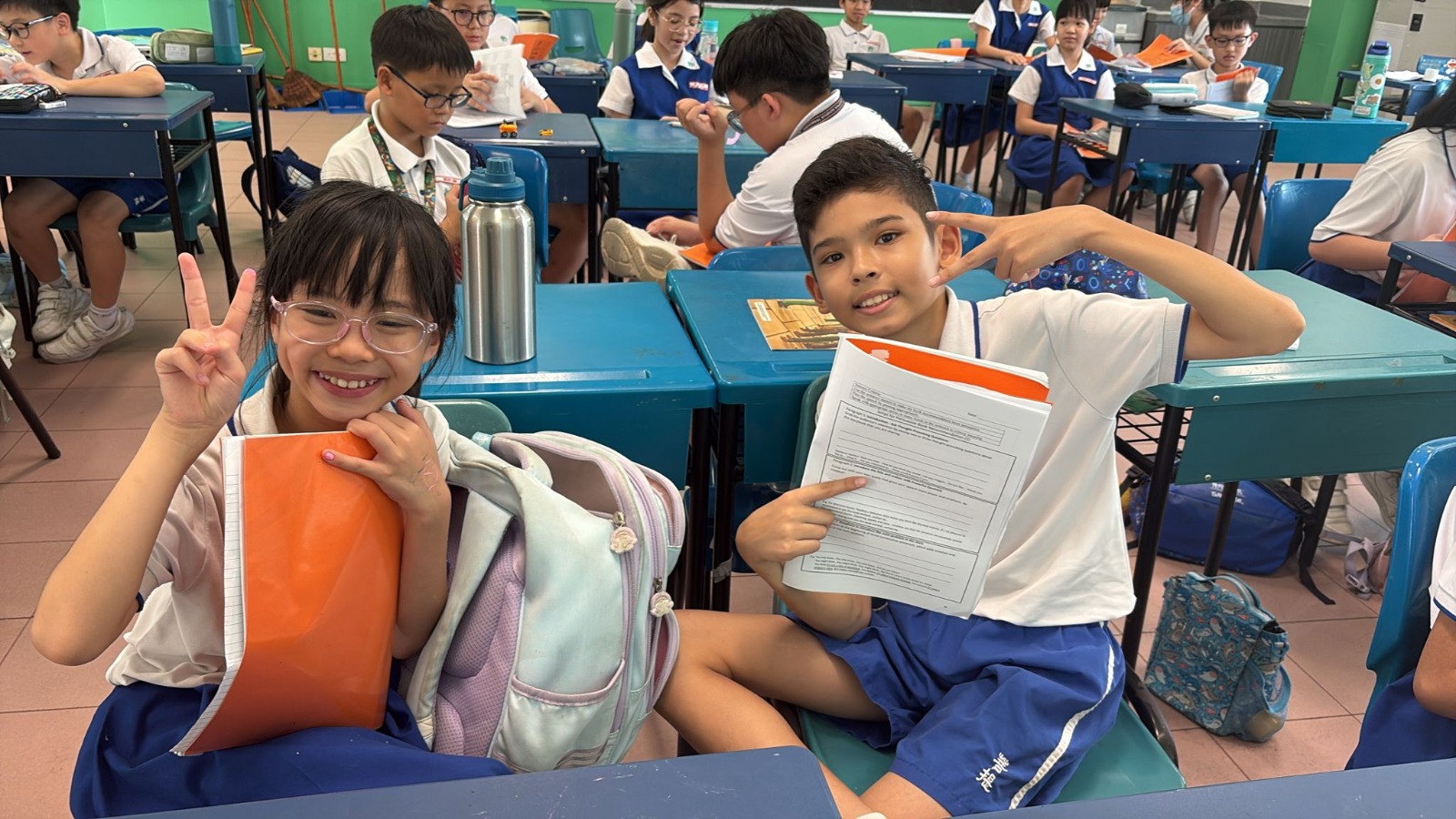 Pupils in class holding on to their favourite storybook taking fun photoshoots.