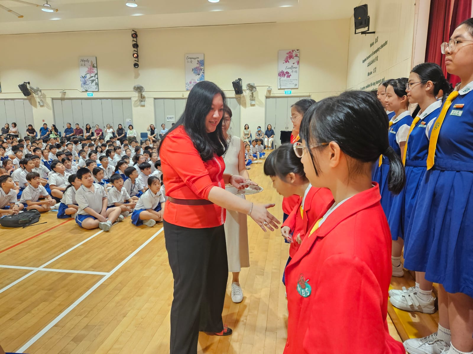 Mrs See congratulating prefect during Prefect Investiture 2026