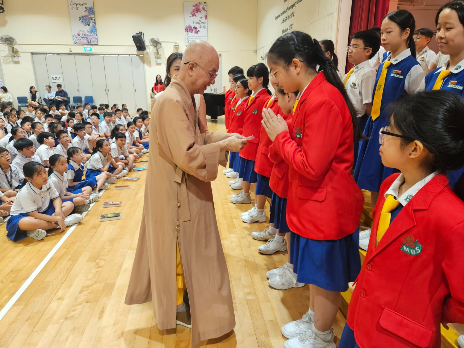 Venerable Kwang Phing awarding Prefect Badge