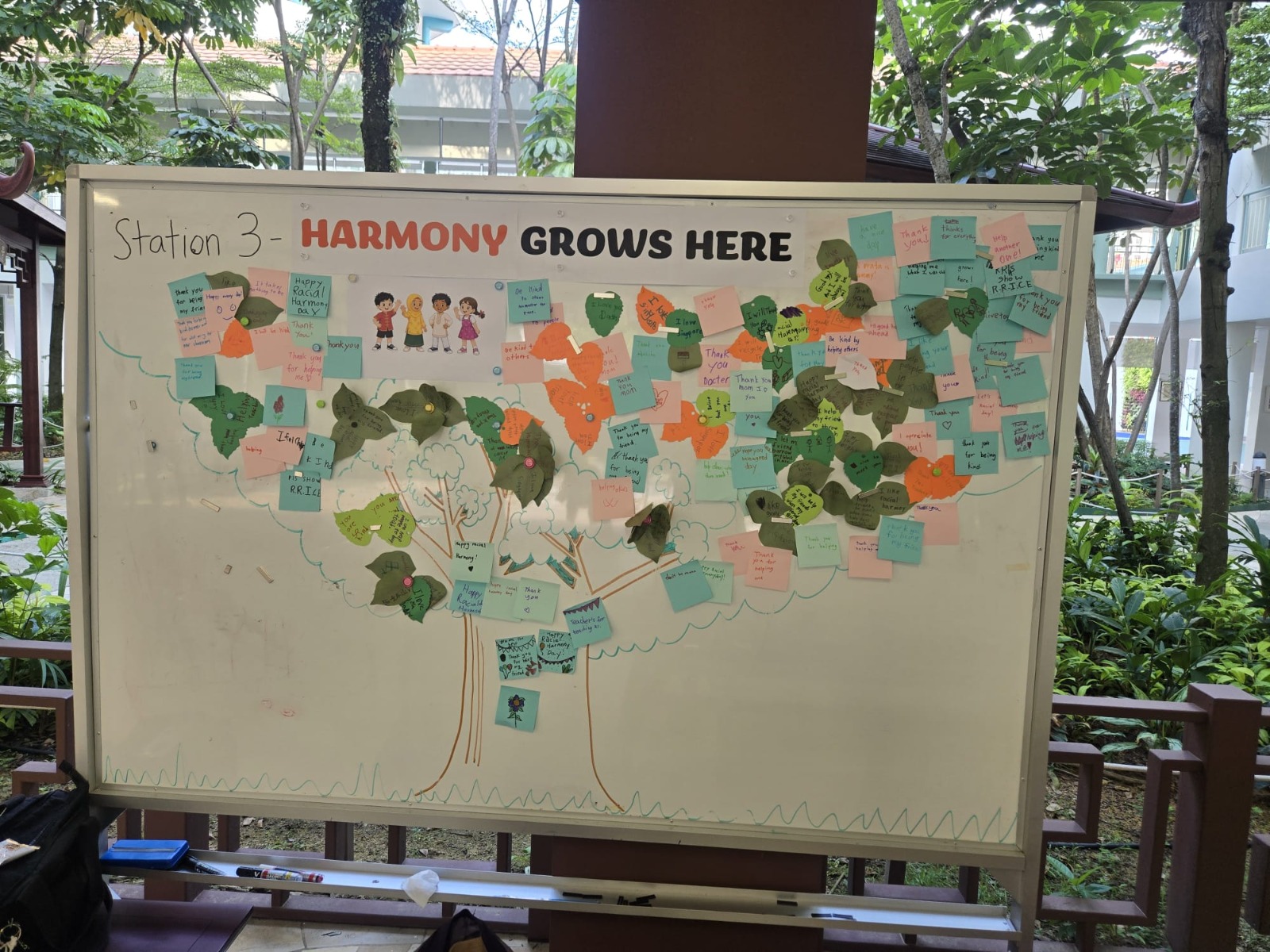 Students contributing well-wishes through Harmony Tree