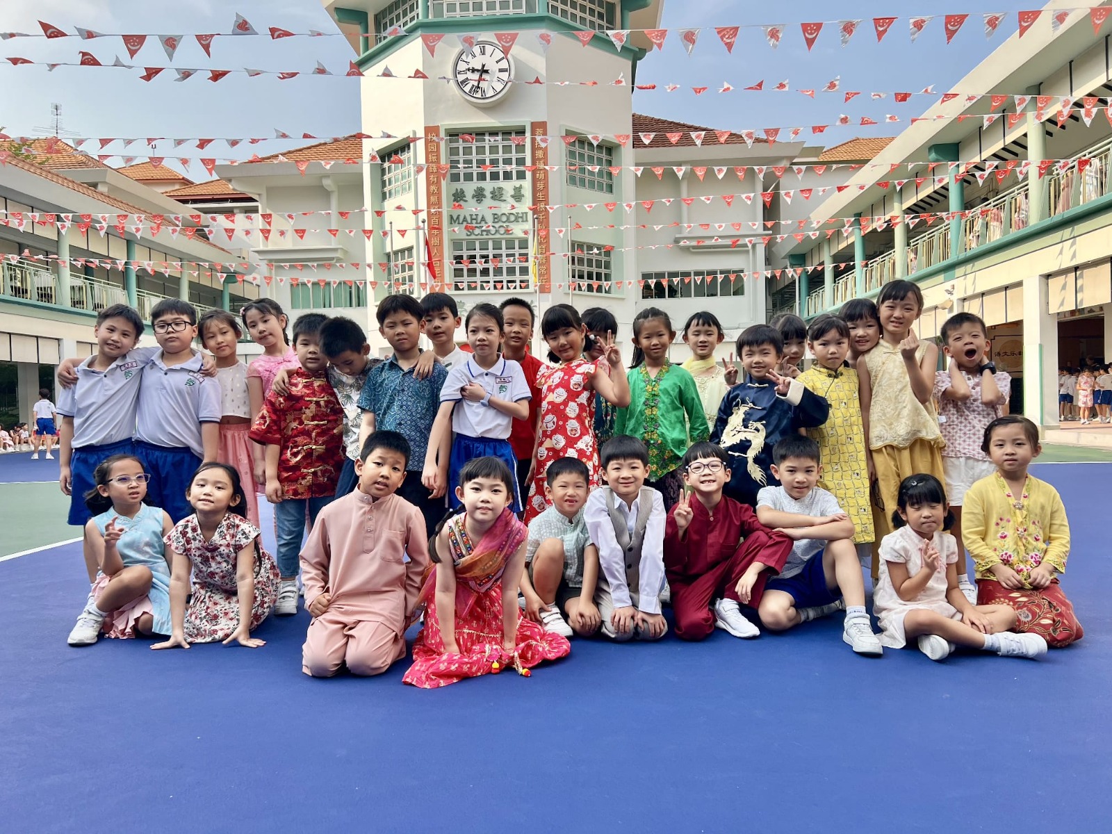 Students dressing up for Racial Harmony Day in traditional costume.