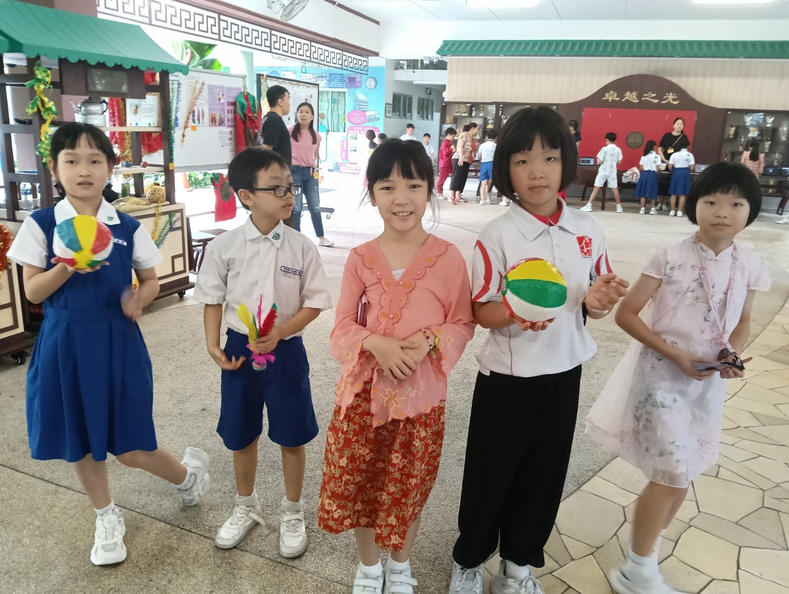 Learning through games on Racial Harmony Day at courtyard.