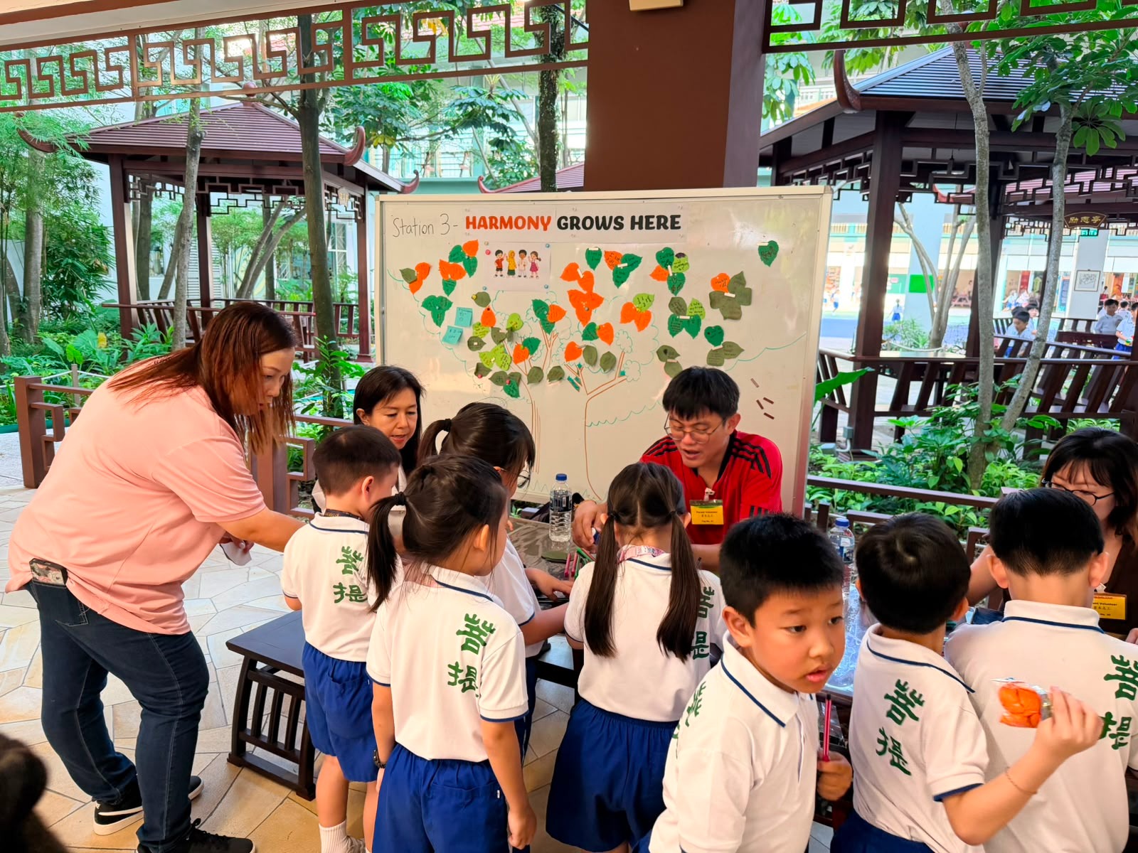 Learning more on racial harmony through booth display guided by parent volunteers.
